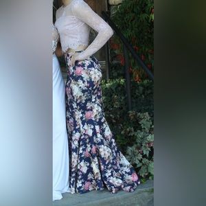 Beautiful prom dress! Worn once. No damage. From Windsor. Bright colors